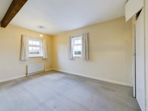 Bedroom One- click for photo gallery